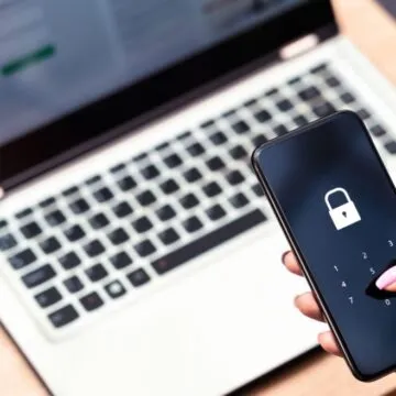 a laptop and phone screen showing a lock icon